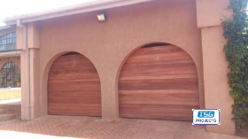 Wood sectional garage doors